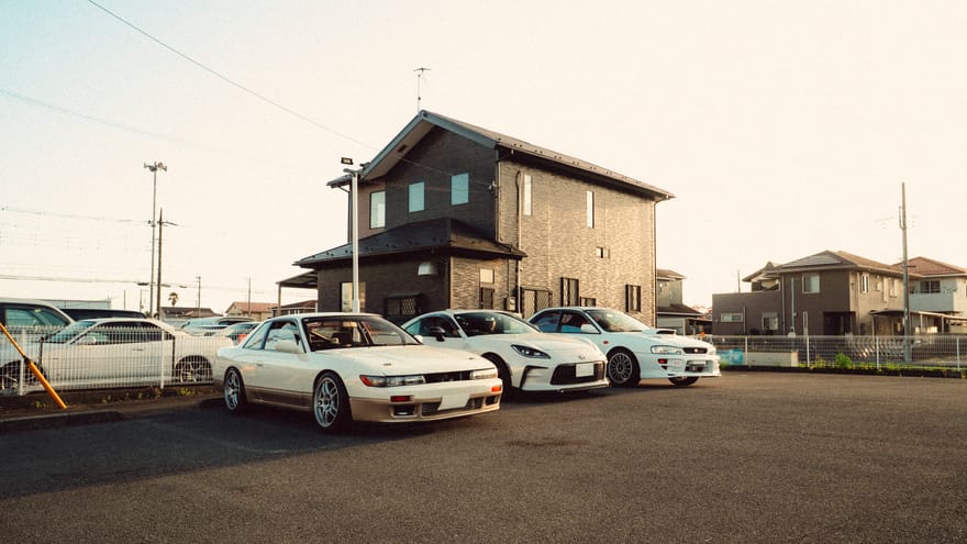 JDM vehicles staged in a Japanese yard